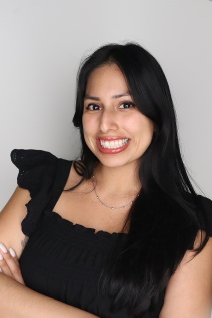 Sofi Sanabria-guillen headshot with arms folded